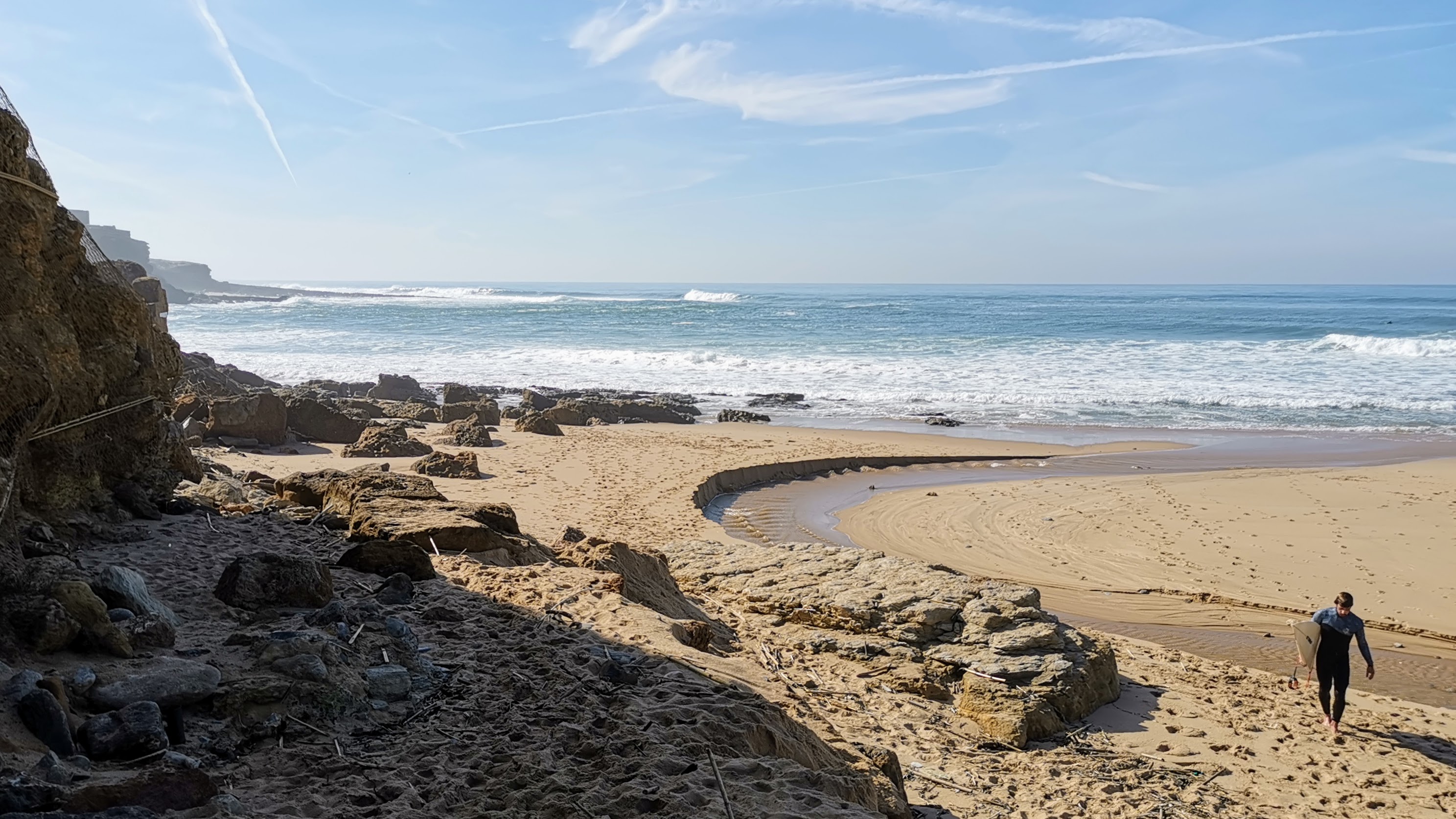 Surfer op het strand